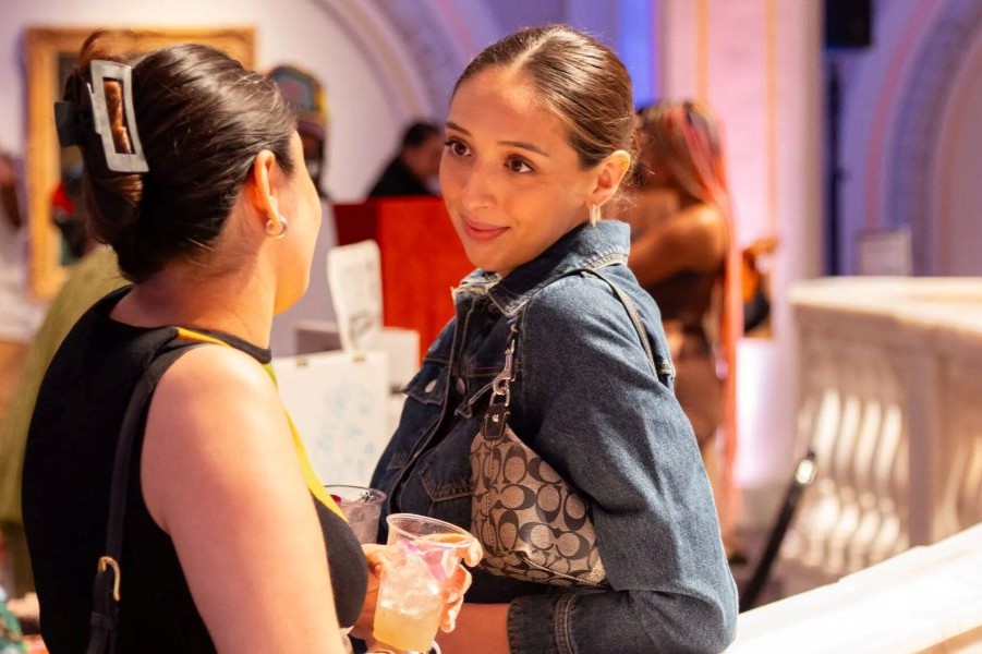 Two women talking at the NWMA Nights